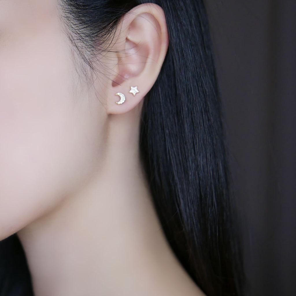 Model wearing cassiopeia earrings