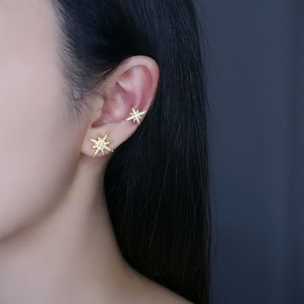 Model wearing gold Alina ear cuff earring