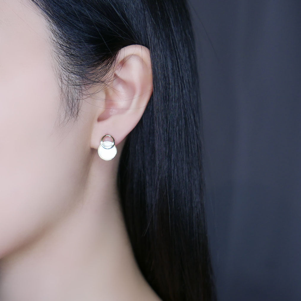 Model wearing Mia Pearl Shell Stud Earrings