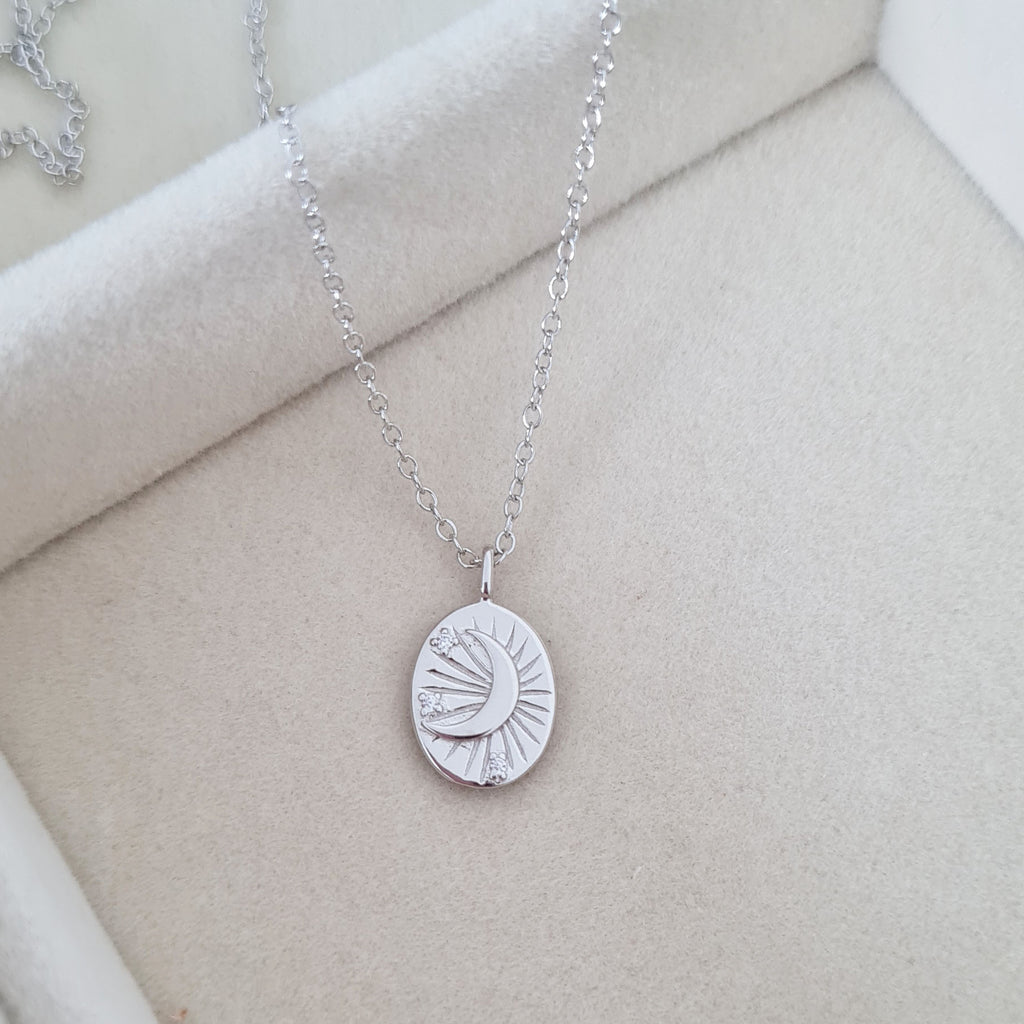 Silver moon disc necklace