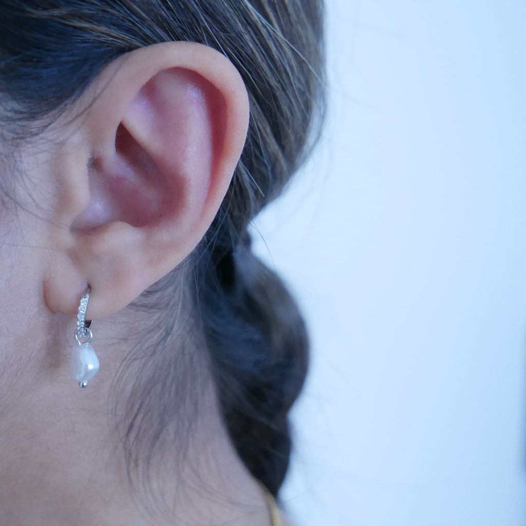 Silver Mini Pearl Drop Earrings on model