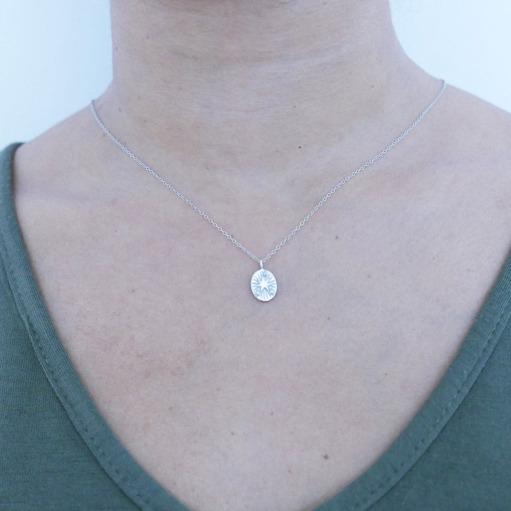 Silver Star Disc Pendant necklace on model
