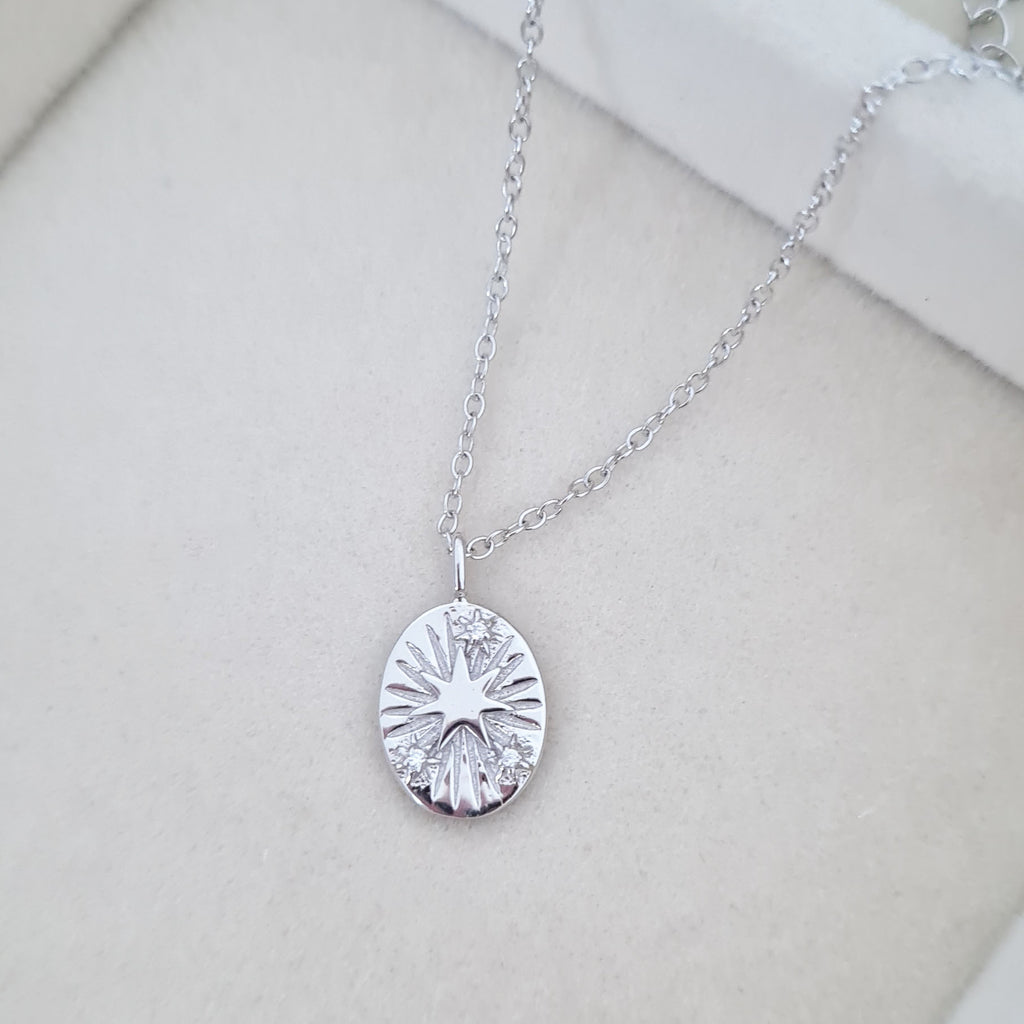 Silver star disc necklace